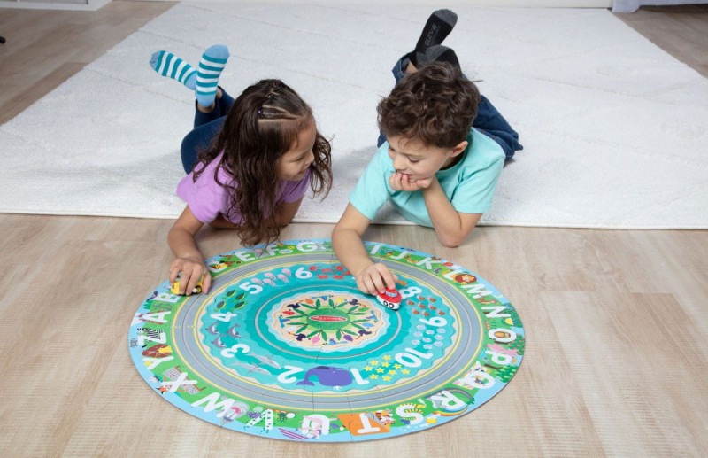 Okrągłe puzzle podłogowe z nakręcanymi pojazdami Melissa & Doug