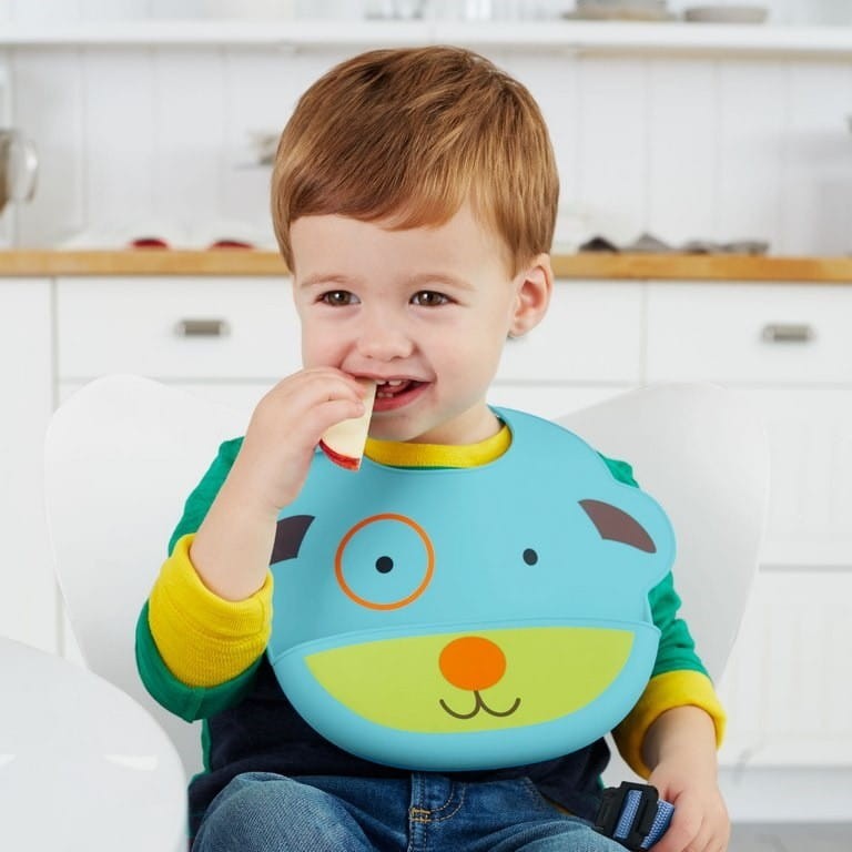 Śliniak silikonowy z kieszonką Zoo Pies - Skip Hop