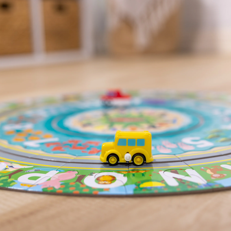 Okrągłe puzzle podłogowe z nakręcanymi pojazdami Melissa & Doug