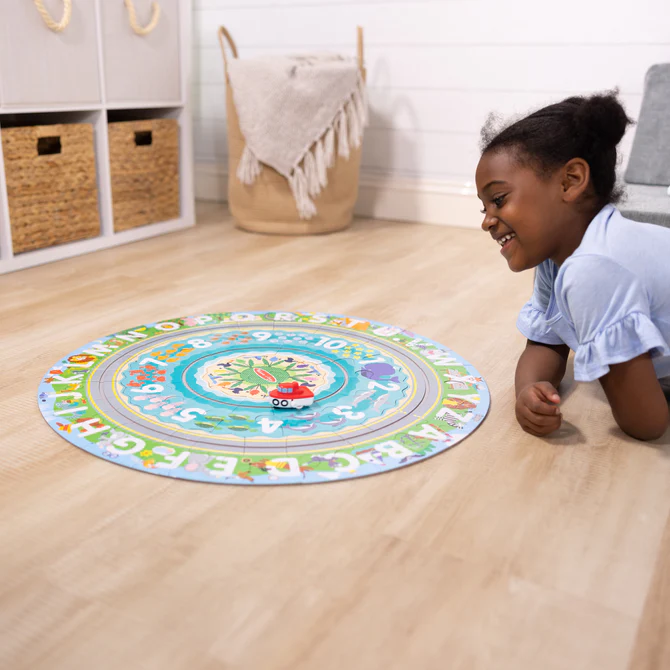 Okrągłe puzzle podłogowe z nakręcanymi pojazdami Melissa & Doug