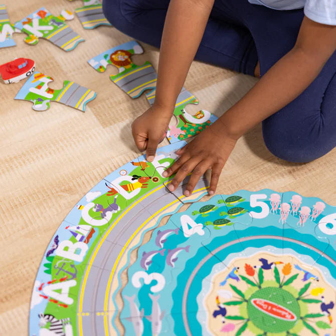 Okrągłe puzzle podłogowe z nakręcanymi pojazdami Melissa & Doug