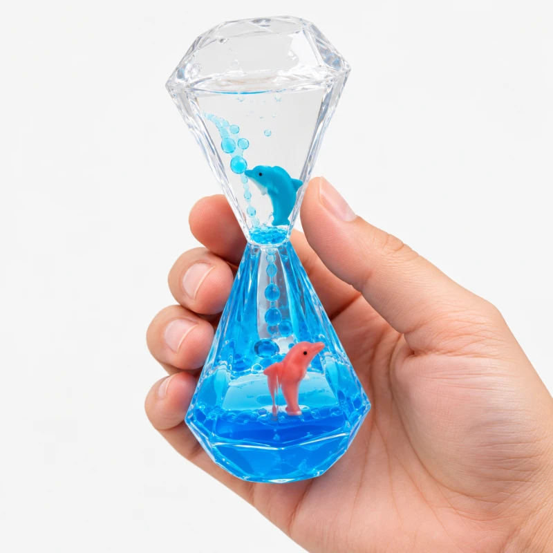 Klepsydra sensoryczna z delfinkami 3 min. wodna klepsydra z ruchomymi figurkami One for Fun, 13 cm